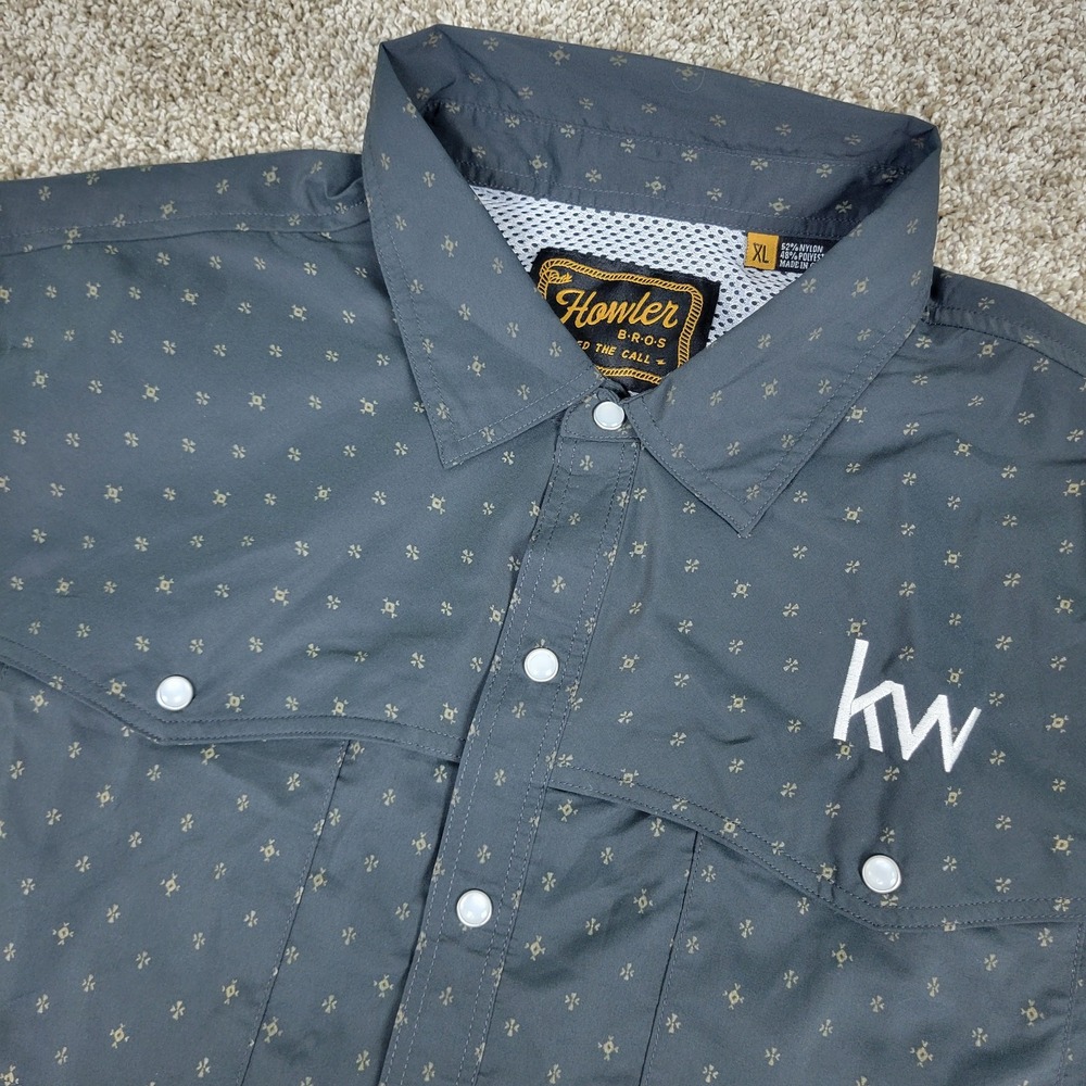 NWT Howler Bros Mens XL Black AOP Geometric Performance Pearl Snap SS